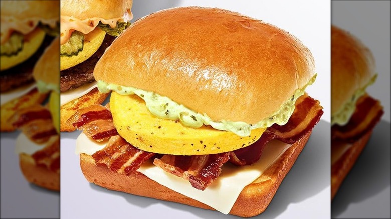 Close-up of CosMc's creamy avocado tomatillo sandwich