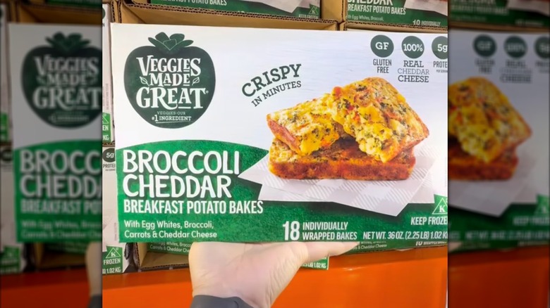 Someone holding a box of Veggies Made Great Broccoli Cheddar Potato Bakes