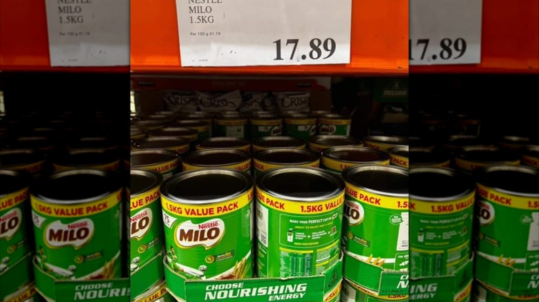 Mirrored image of Milo on Costco shelf with price listed on shelf above