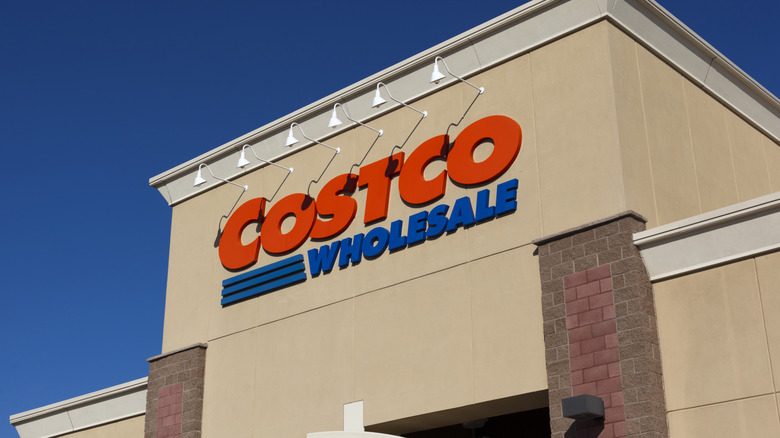Costco storefront against bright blue sky