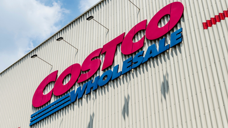 Costco Wholesale sign above a store location during the day