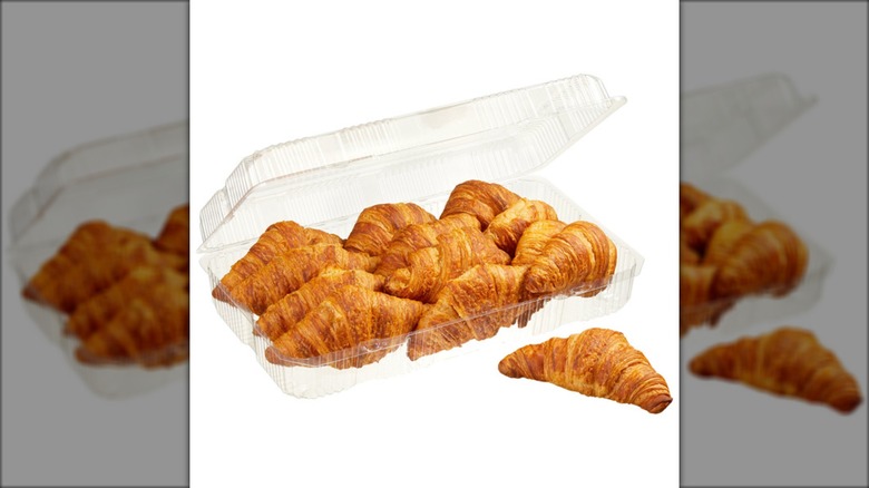 Opened Kirkland Signature butter croissants package against a white background