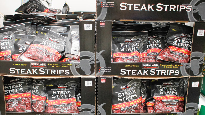 Kirkland Signature steak strips in boxes on a store shelf