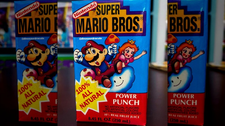 Mirrored image of Super Mario Bros Power Punch juice box on table