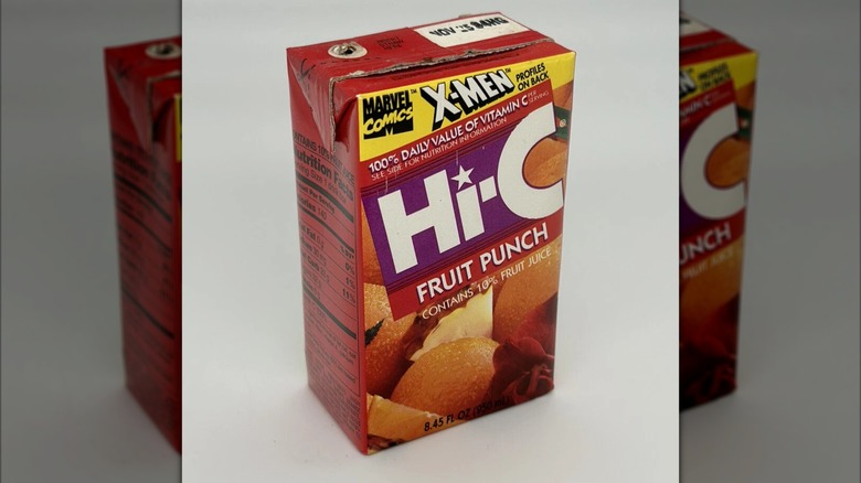 Mirrored image of Hi-C Fruit Punch juice box on grey background