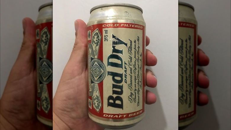 mirrored image of Bud Dry can
