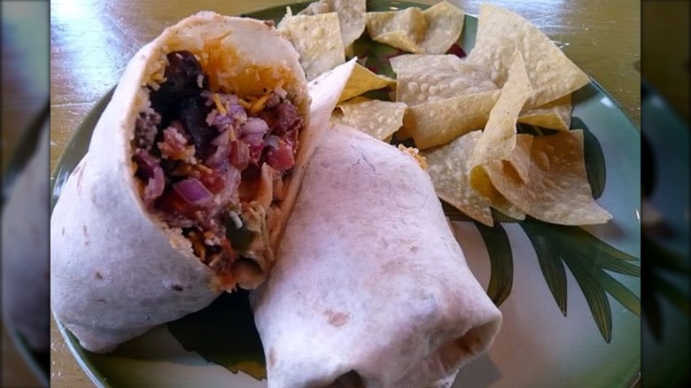 Close up of Taco Bell Bacon Cheeseburger Burrito.