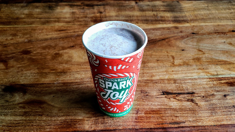 Dutch Bros Hazelnut truffle mocha on wooden table