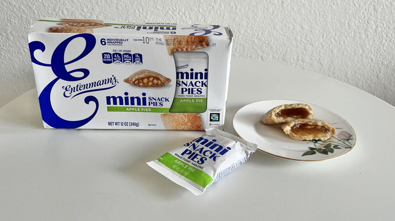 Entenmann's applie pie mini cut in half on plate