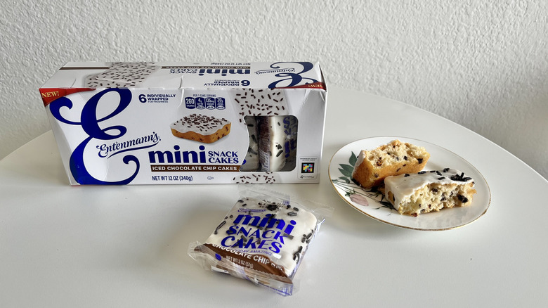 Entenmann's iced chocolate chip cake cut in half