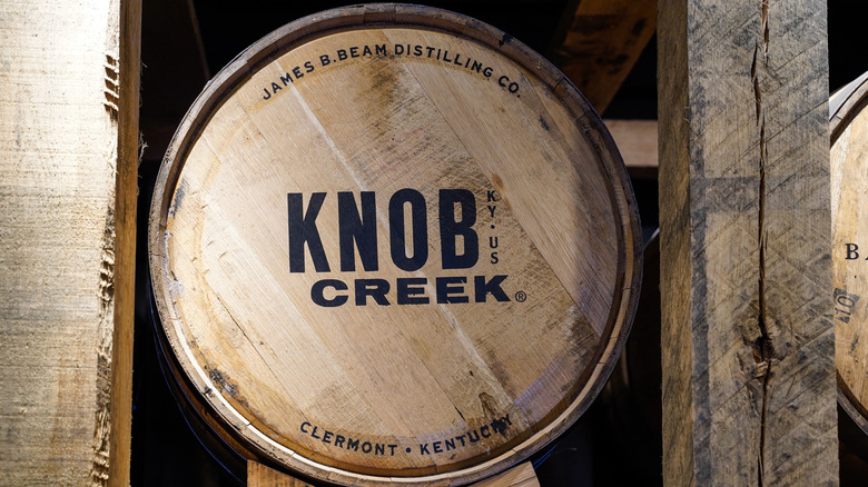A Knob Creek whiskey barrel on the shelf