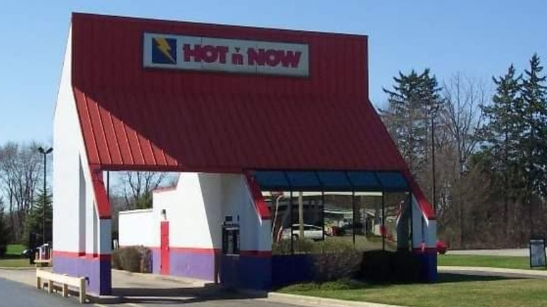 Exterior of Hot N' Now restaurant on sunny day