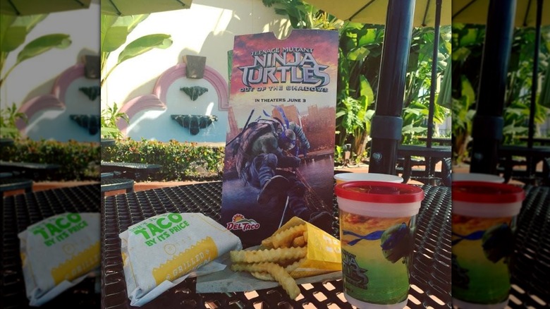 Ninja Turtles Del Taco kids meal on table outside, mirrored image