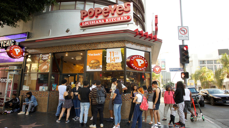 Customers line up outside Popeyes
