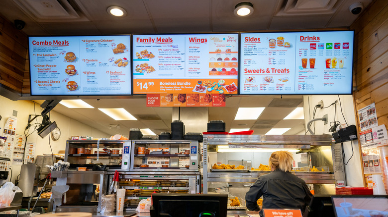 Employee at Popeyes working