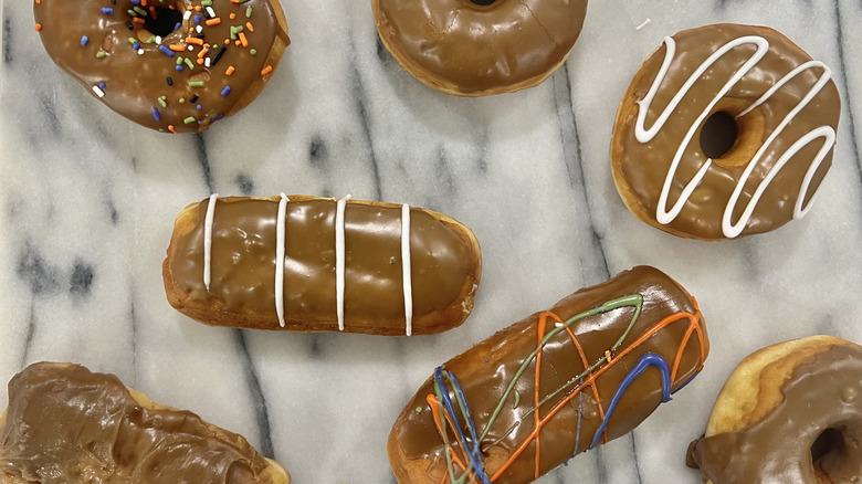 7 different grocery store maple iced donuts.
