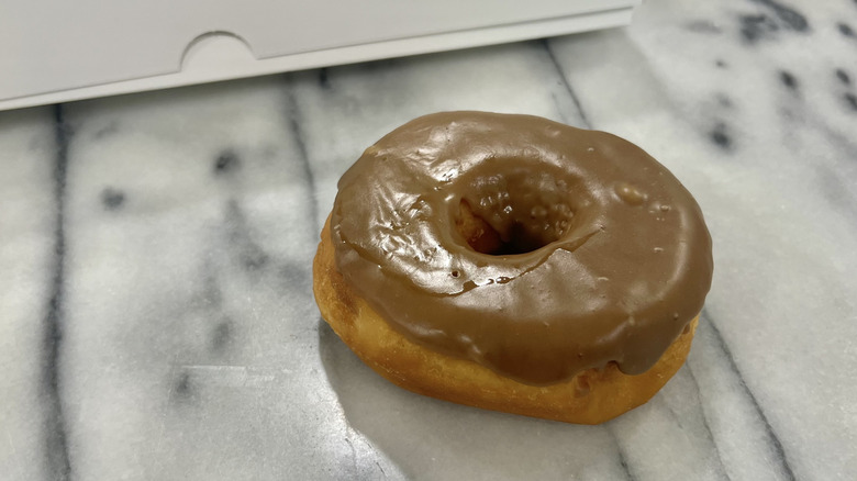 Kroger maple iced donut on marble
