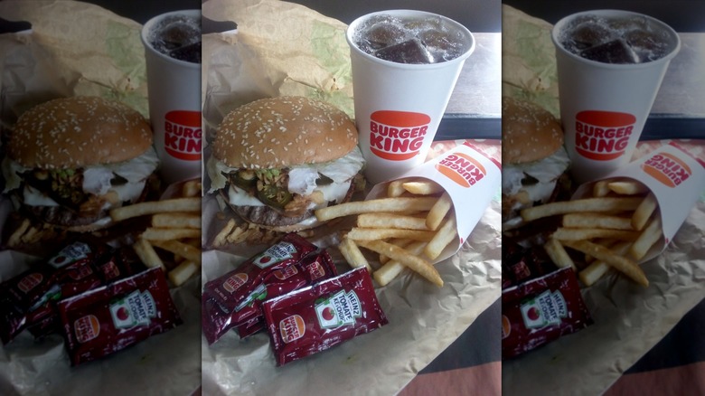 Burger King Guacamole Crunch King with fries and a drink