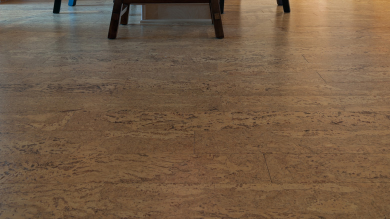 Cork flooring in kitchen, island with chairs and stool featured