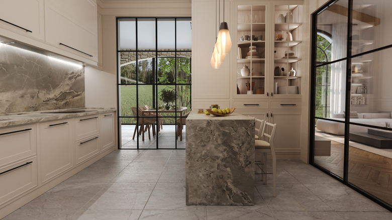 Large white and marble gray kitchen with large-format tiles