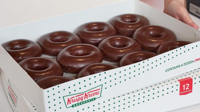 Chocolate glazed donuts in Krispy Kreme box