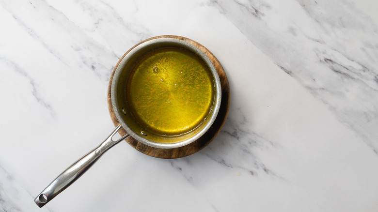 Orange soaking syrup in saucepan