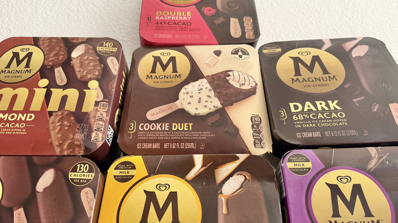 Different Magnum ice cream bar boxes on a table
