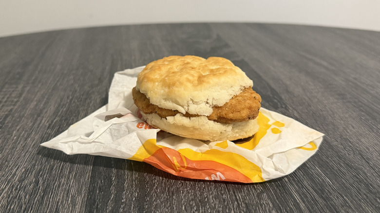 A cutlet of chicken on a biscuit