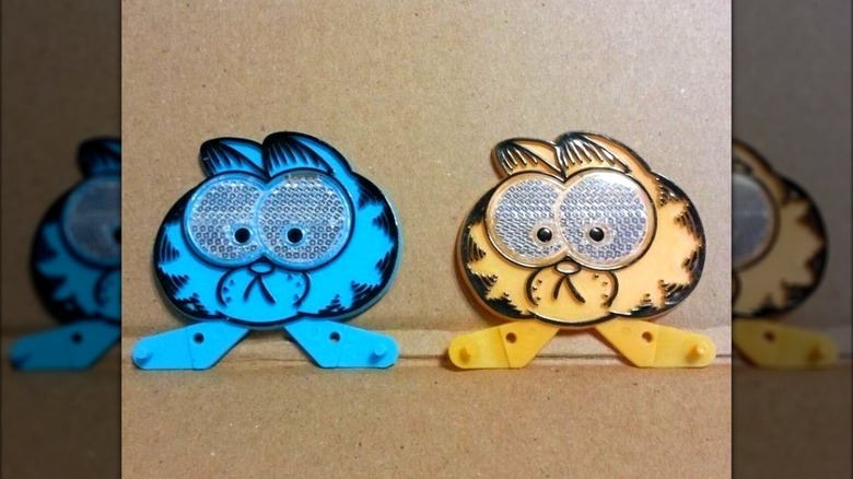 Two Garfield Bike Reflectors in blue and orange colors