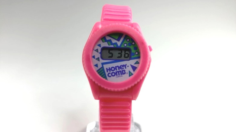 Honeycomb cereal pink watch on white background
