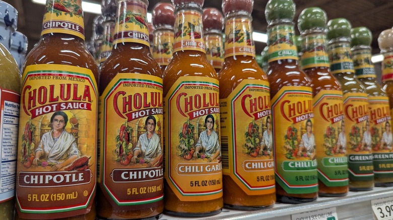 Cholula hot sauces on shelf at Publix store