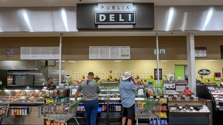 People waiting at Publix deli counter