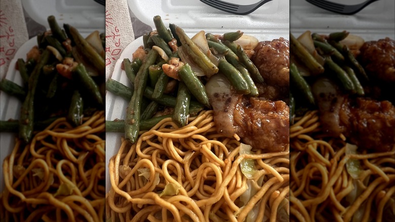 String bean chicken and other Panda Express dishes in to go container
