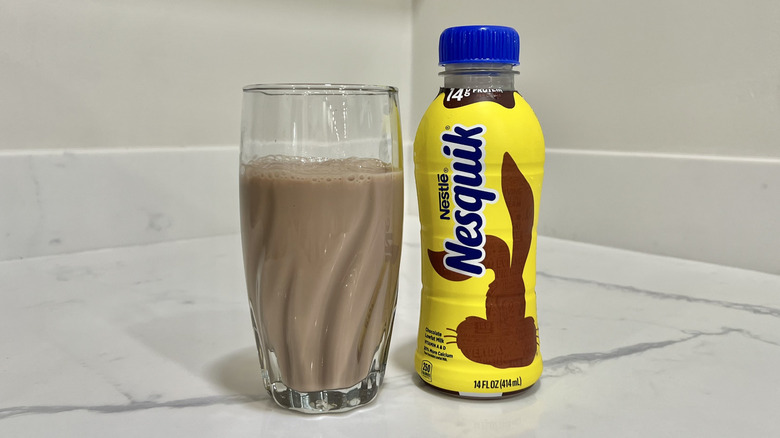 Nesquik Chocolate milk in a glass.