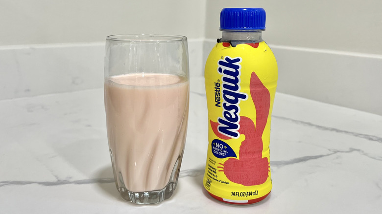 Nesquik Strawberry milk in a glass.