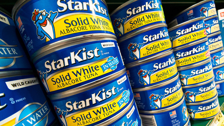cans of StarKist tuna on grocery store shelf