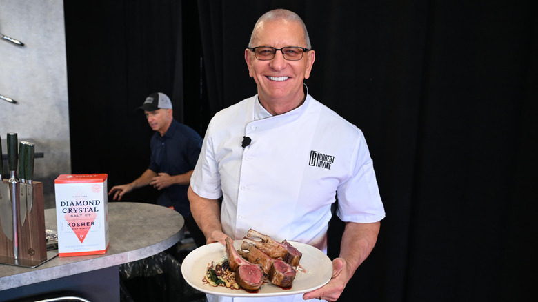 Robert Irvine gives a culinary demonstration during the Food Network New York City Wine & Food Festival