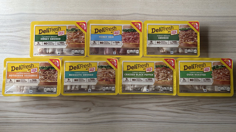 Oscar Mayer Deli Fresh meats on wooden table