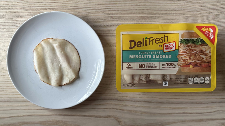 Deli Fresh Mesquite Smoked Turkey Breast on wooden table