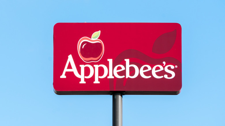 Applebee's sign against blue sky