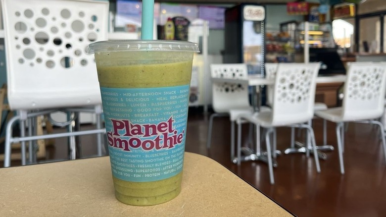 Fiji Island Breeze smoothie on table inside Planet Smoothie