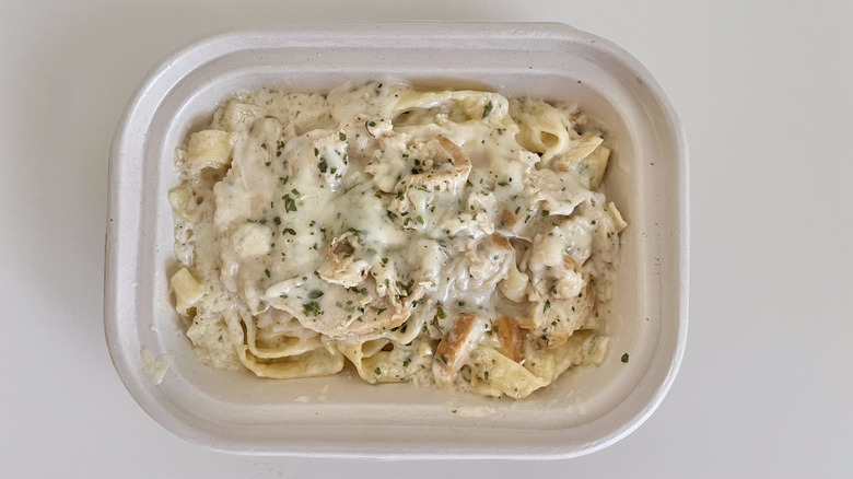 Fettuccine Alfredo with chicken on top