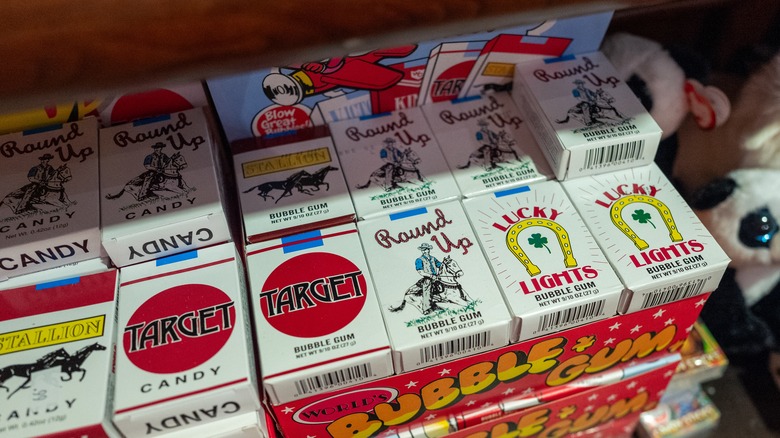 candy cigarette boxes displayed on a shelf