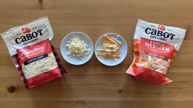 Bags of Cabot cheeses on wooden table