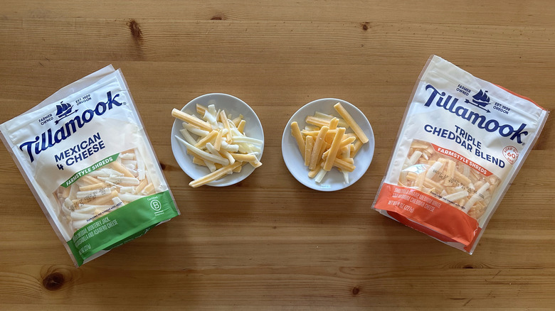 Bags of Tillamook cheese on wooden table