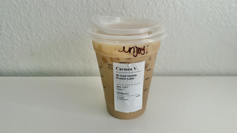 Iced Vanilla Protein Latte in a plastic cup