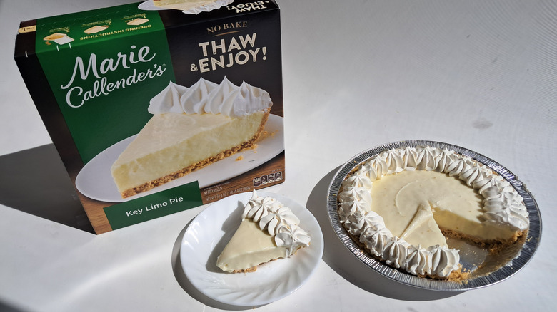 cut pie next to box