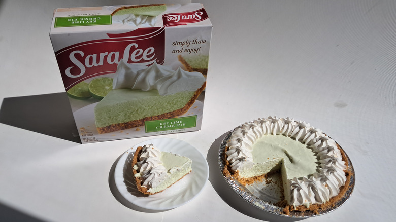 cut pie next to box