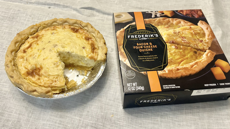 Meijer bacon and four cheese quiche with slice missing.