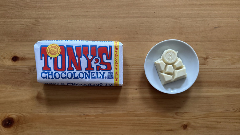 Tony's Chocolonely White Chocolate Bar on wooden table